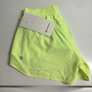 lululemon hottie hot shorts 4 inch, low rise, size 4, in yellow